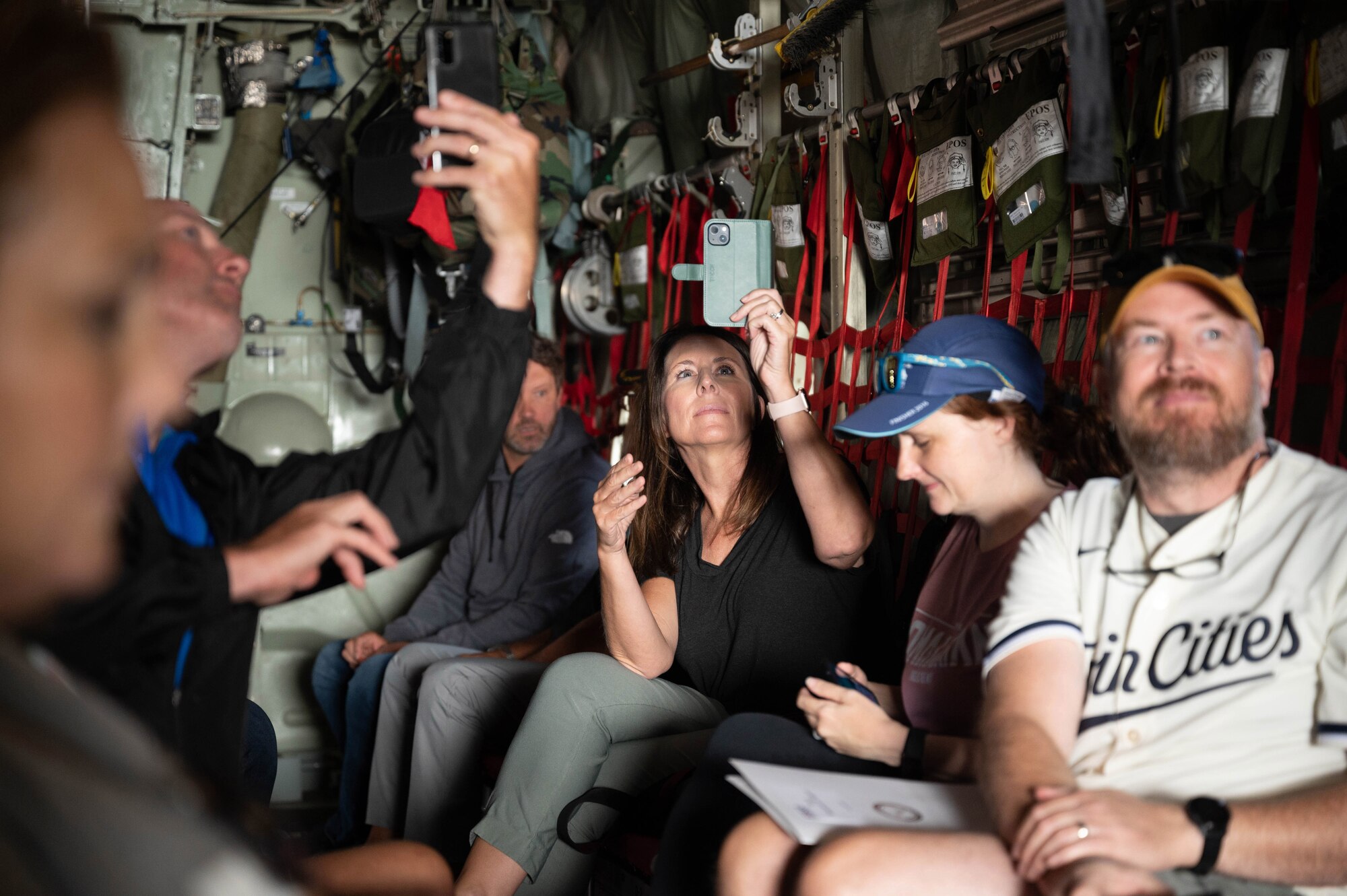 934th Airlift Wing Airmen’s civilian employers watch as the back door opens on a C-130H Hercules aircraft at Minneapolis-St. Paul Air Reserve Station, Minn. Aug. 5, 2023. Employers Day is an opportunity for 934 AW Airmen to invite their civilian employers to a base event to thank them for their support. (U.S. Air Force photo by Senior Airman Victoriya Tarakanova)