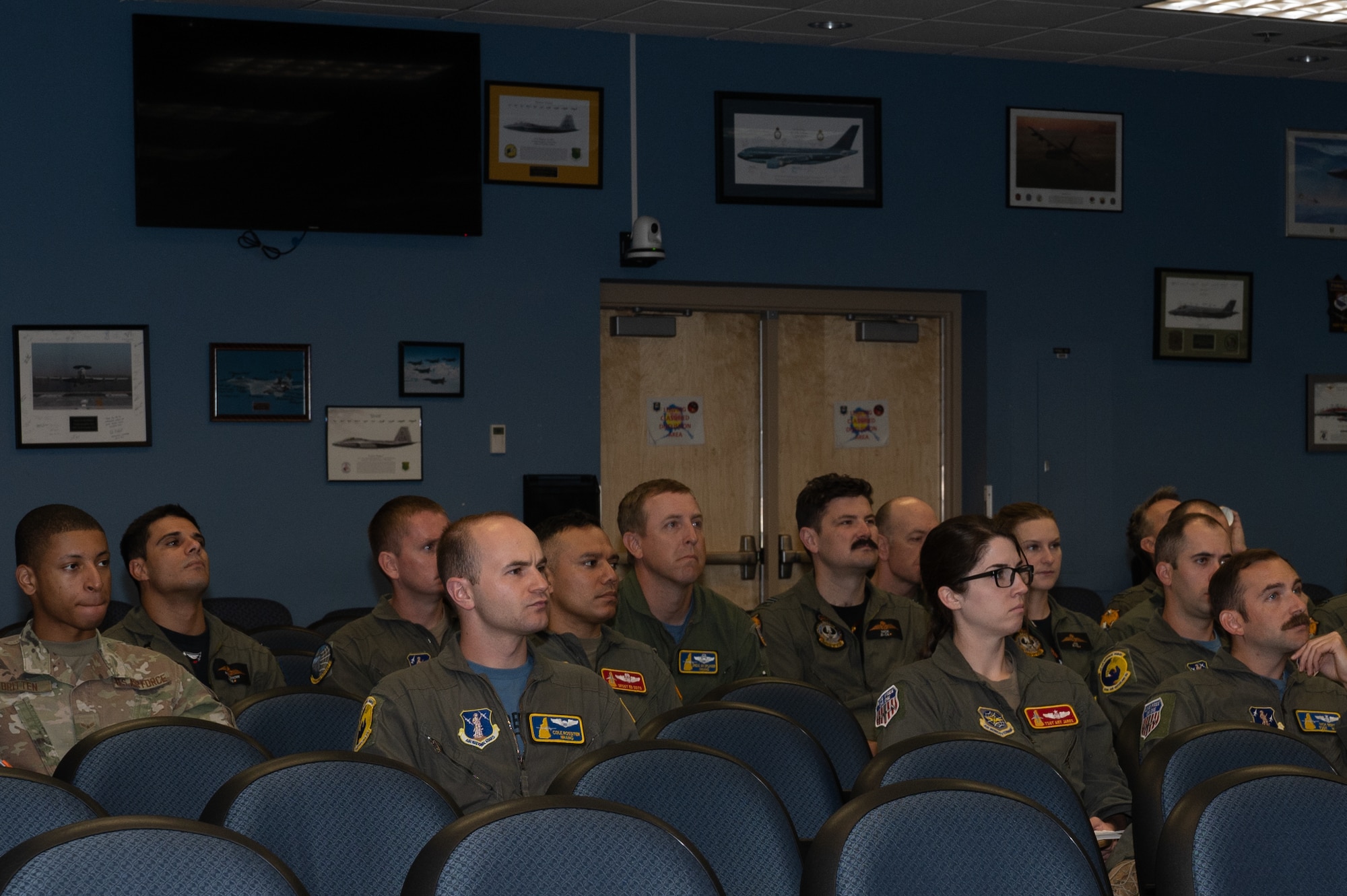 U.S. Air Force and Royal Australian Air Force flight crew members attend a pre-brief