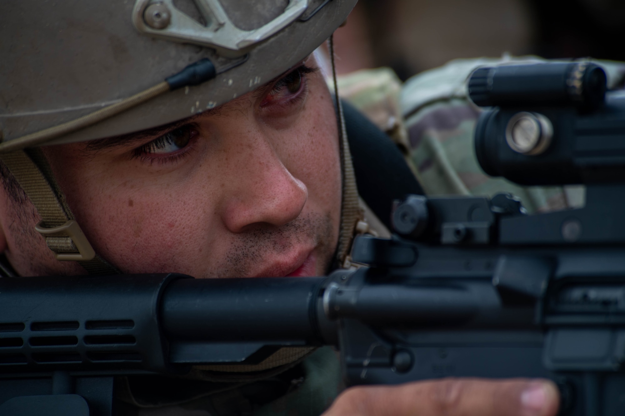 U.S. Air Force Staff Sgt. Jesus Acuna-Tellez, 435th Contingency Response Squadron mobile aerial port craftsman, participates in a simulated base attack scenario during Thracian Summer 2023 at Cheshnegirovo Air Base, Bulgaria, Aug. 10, 2023.
