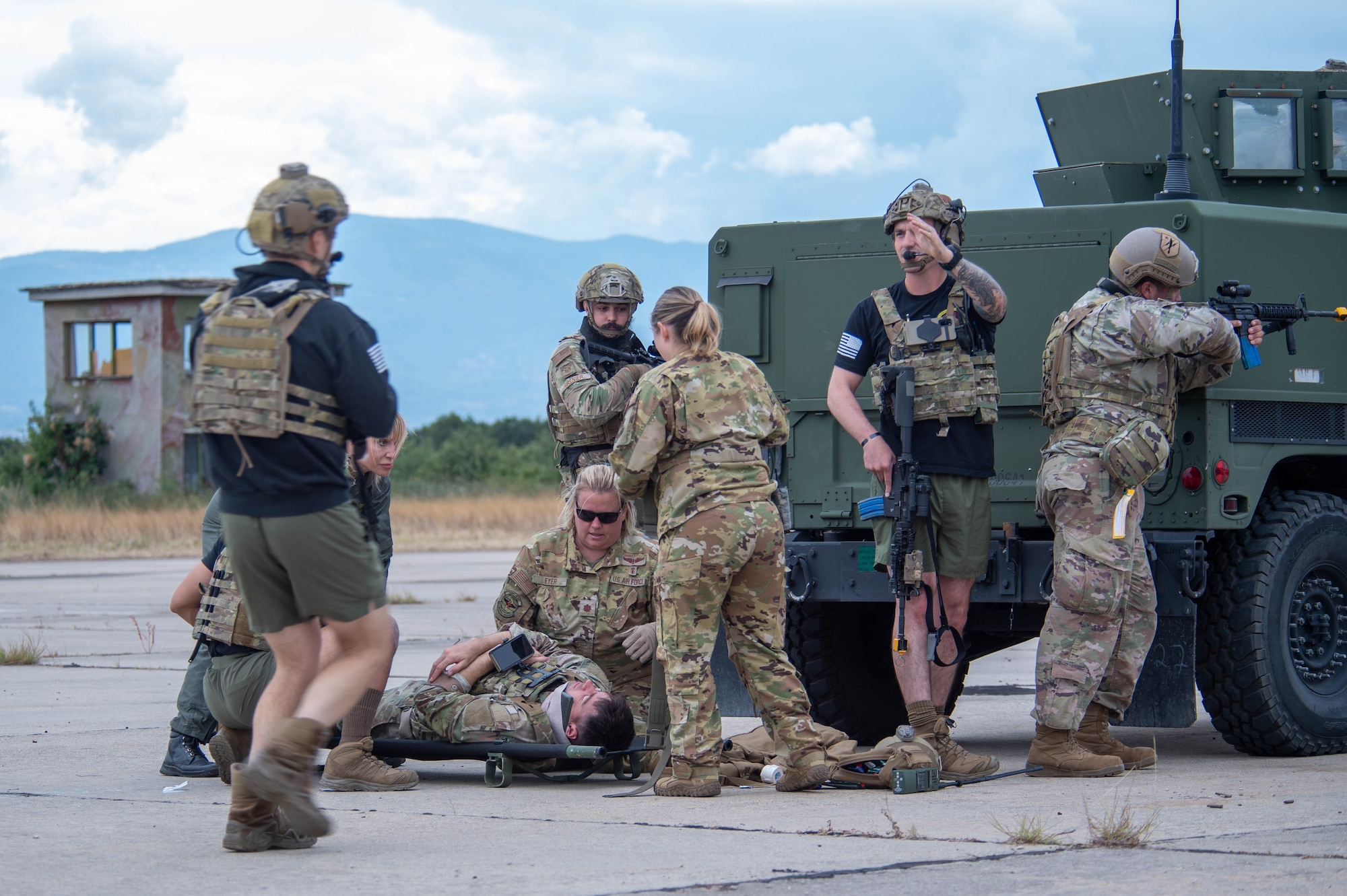 U.S. Air Force Airmen from the 86th Aeromedical Evacuation Squadron and 435th Contingency Response Squadron team up in a joint exercise during Thracian Summer 2023 at Cheshnegirovo Air Base, Bulgaria, Aug. 10, 2023.