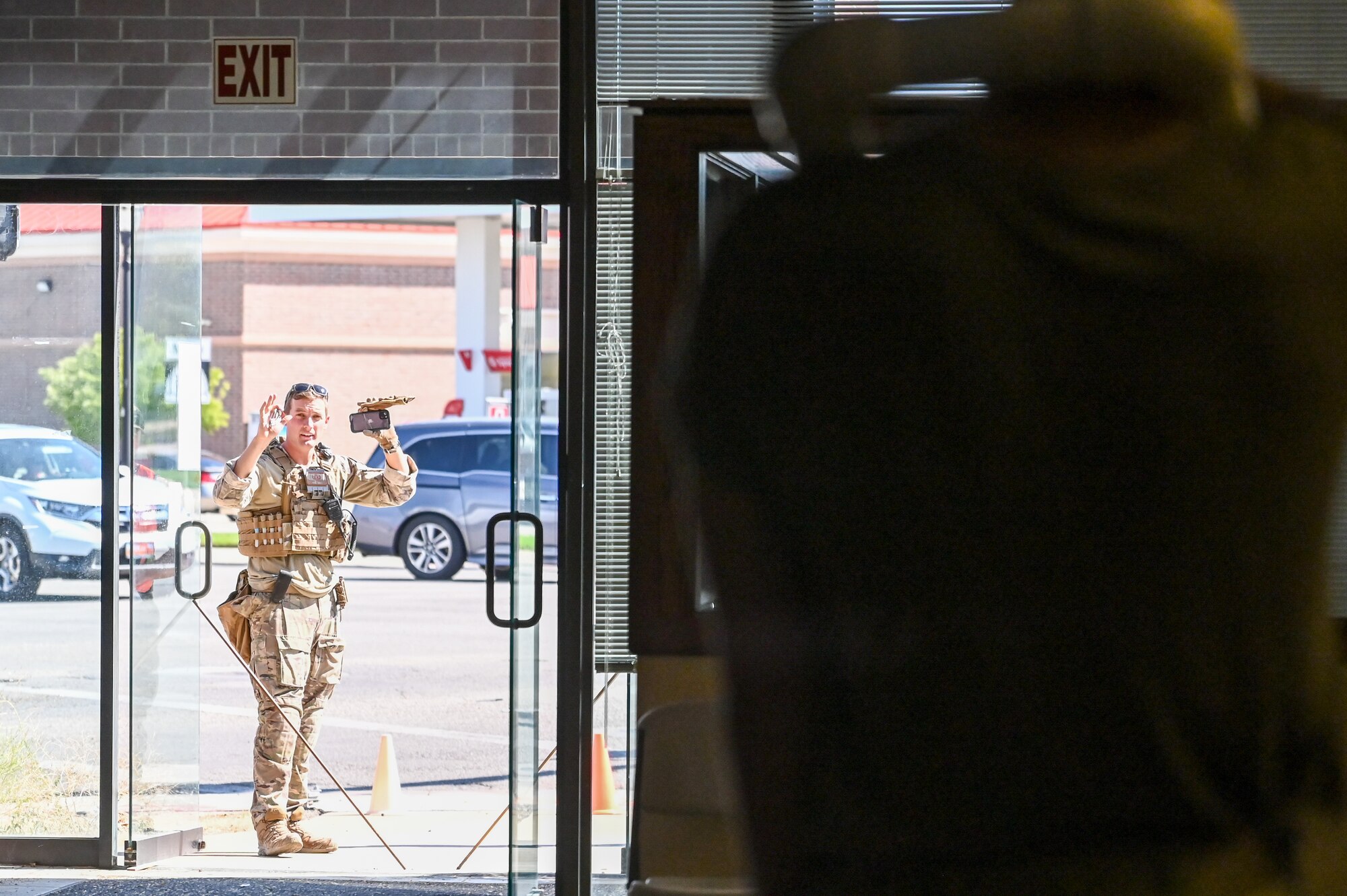 Staff Sgt. Zack Pennington, 775th Explosive Ordnance Disposal Flight, encounters a simulated hostage situation during an off-base training event Aug. 10, 2023, in Roy, Utah.