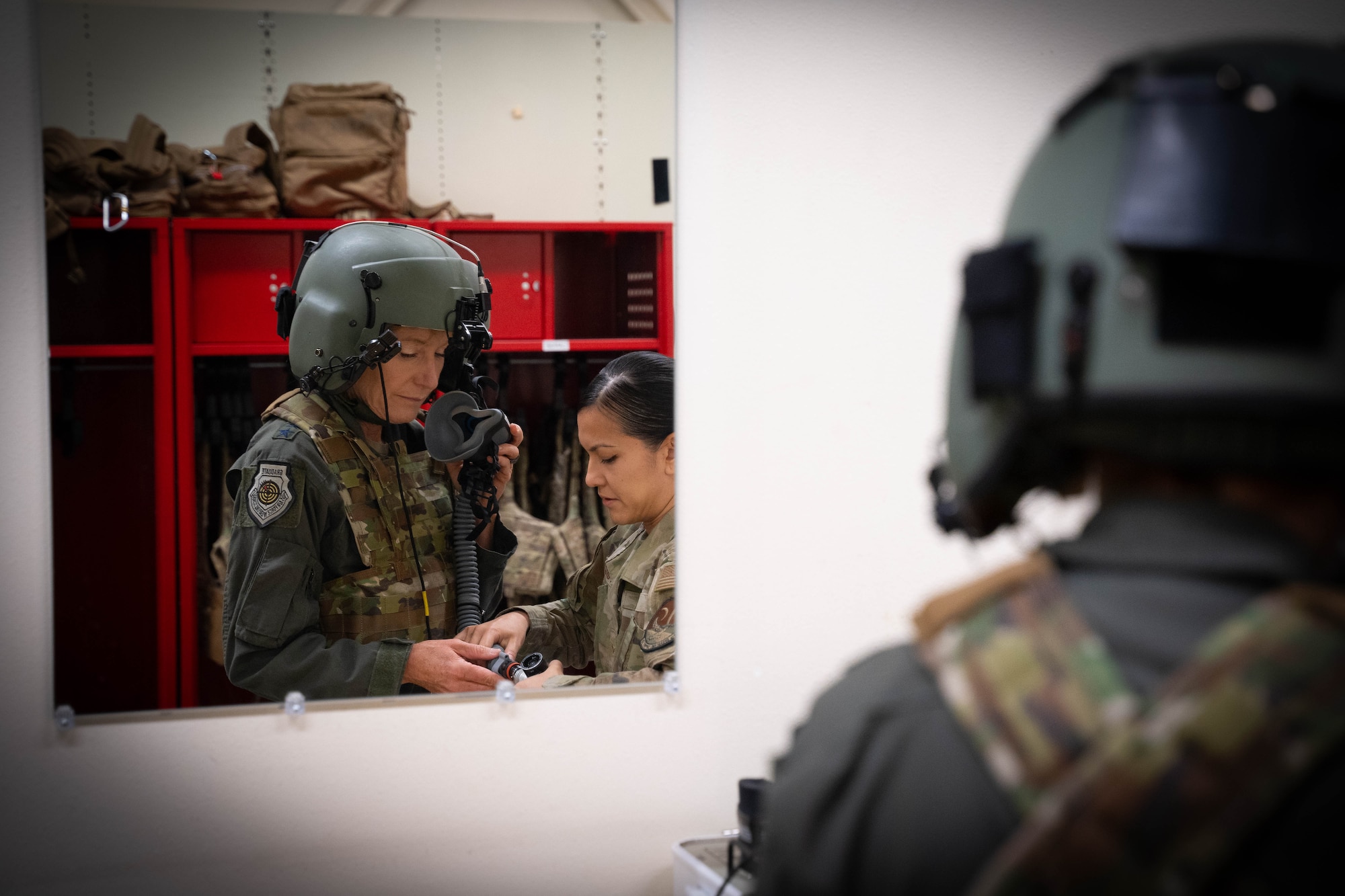 Maj. Gen. Jeannie M. Leavitt gets suited up with the aircrew flight equipment shop prior to her final flight