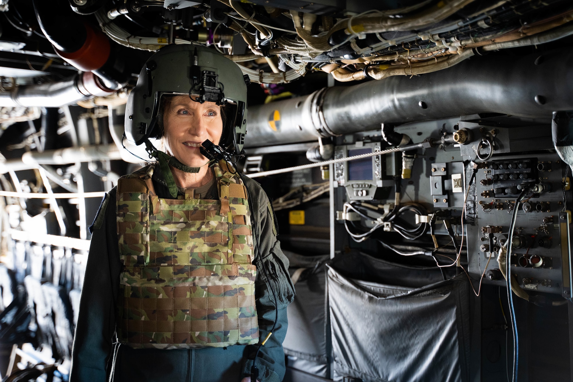 Maj. Gen. Jeannie M. Leavitt stands in the back of a CV-22 Osprey