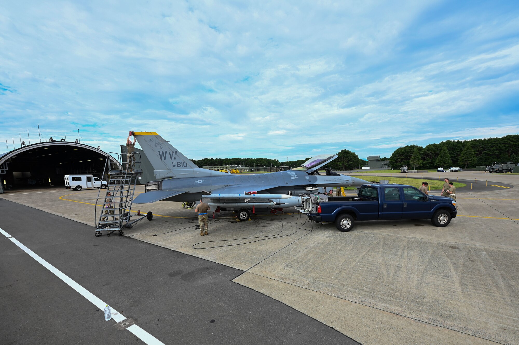 Airmen assigned to 87th Electronic Warfare Squadron Combat Shield assess the defensive system readiness of a U.S Air Force F-16 Fighting Falcon at Misawa Air Base, Japan, Aug. 9, 2023. Combat Shield is the lead U.S. Air Force air electronic warfare (EW) assessment program and is responsible for advising all MAJCOM-specific EW assessment programs. (U.S. Air Force photo by Staff Sgt. Ericka A. Woolever)