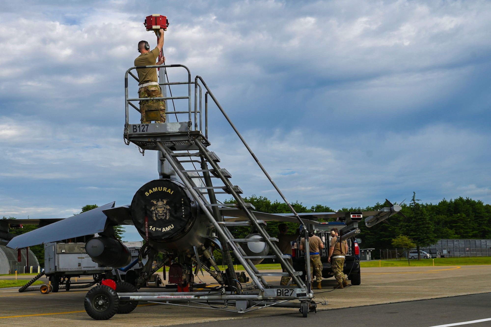 Airmen assigned to 87th Electronic Warfare Squadron Combat Shield assess the defensive system readiness of a U.S Air Force F-16 Fighting Falcon at Misawa Air Base, Japan, Aug. 9, 2023. Combat Shield ensured U.S. Air Force air assets at Misawa Air Base have electronic warfare combat readiness and are effective to support a free and open Indo-Pacific. (U.S. Air Force photo by Staff Sgt. Ericka A. Woolever)
