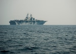 The amphibious assault ship USS Bataan (LHD 5) steams underway in the Arabian Gulf.