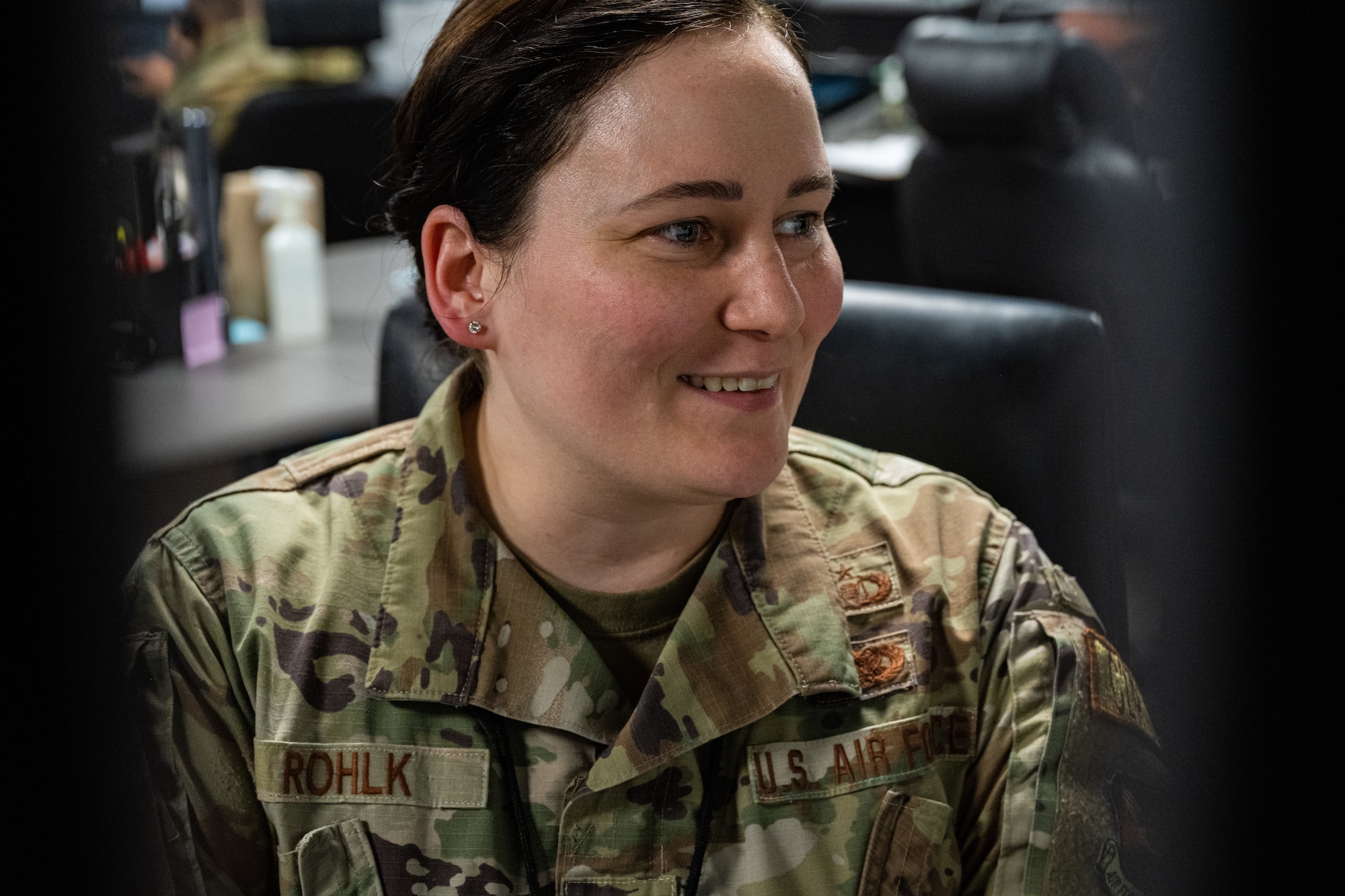 Tech Sgt. Sarah Rohlk, non commissioned officer in charge of nuclear command and control operation training at the Command Post, checks and responds to emails.