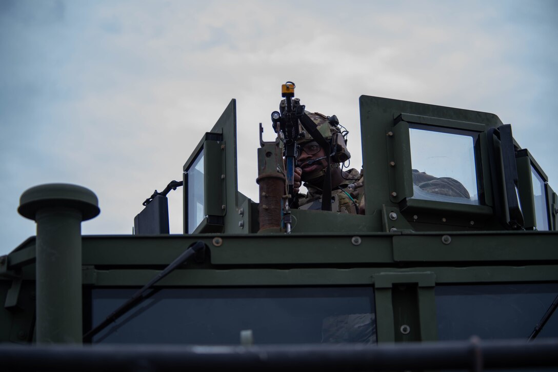 U.S. Air Force Staff Sgt. E-Quantay Mason, 435th Security Forces Squadron contingency response team member, participates in a simulated base attack exercise during Thracian Summer 2023 at Cheshnegirovo Air Base, Bulgaria, Aug. 10, 2023.