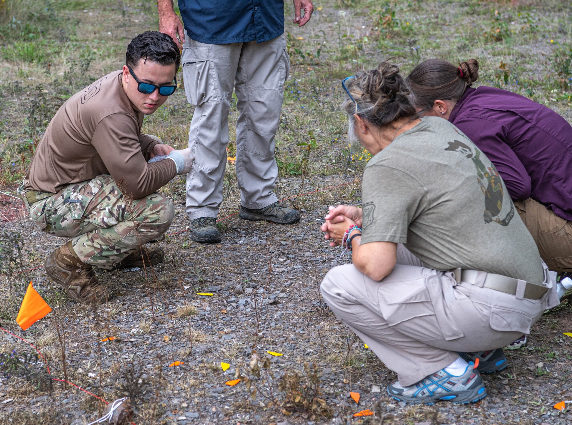 People look for evidence on the ground