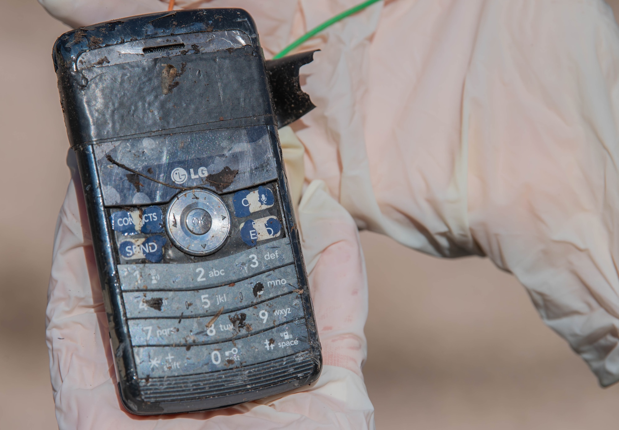 A cell phone is examined