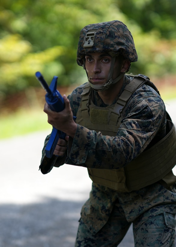 U.S. Marine Corporal Isay Baca (left), Sgt Elisha Fink (center) and Staff Sgt. Christian Dejesus (right) with U.S. Marine Corps Forces, Europe and Africa pose with their new Marine Corps Martial Arts Instructor (MAI) belts during a MAI course in Boblingen, Germany on Aug. 10, 2023. During MAI training, a diverse array of weapons can be employed to cultivate comprehensive combat skills, while also emphasizing rigorous physical conditioning.