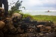 U.S. Marine Corps Pfc. Freddy Peubla, a machine gunner with 2nd Battalion, 5th Marine Regiment, 1st Marine Division, fires a M240B machine gun during a littoral live fire exercise for Marine Aviation Support Activity at Punta Baja, Palawan, Philippines, July 15, 2023. MASA 23 is a bilateral exercise between the Armed Forces of the Philippines and the U.S. Marine Corps, aimed at enhancing interoperability and coordination in support of U.S.-Philippine mutual defense.