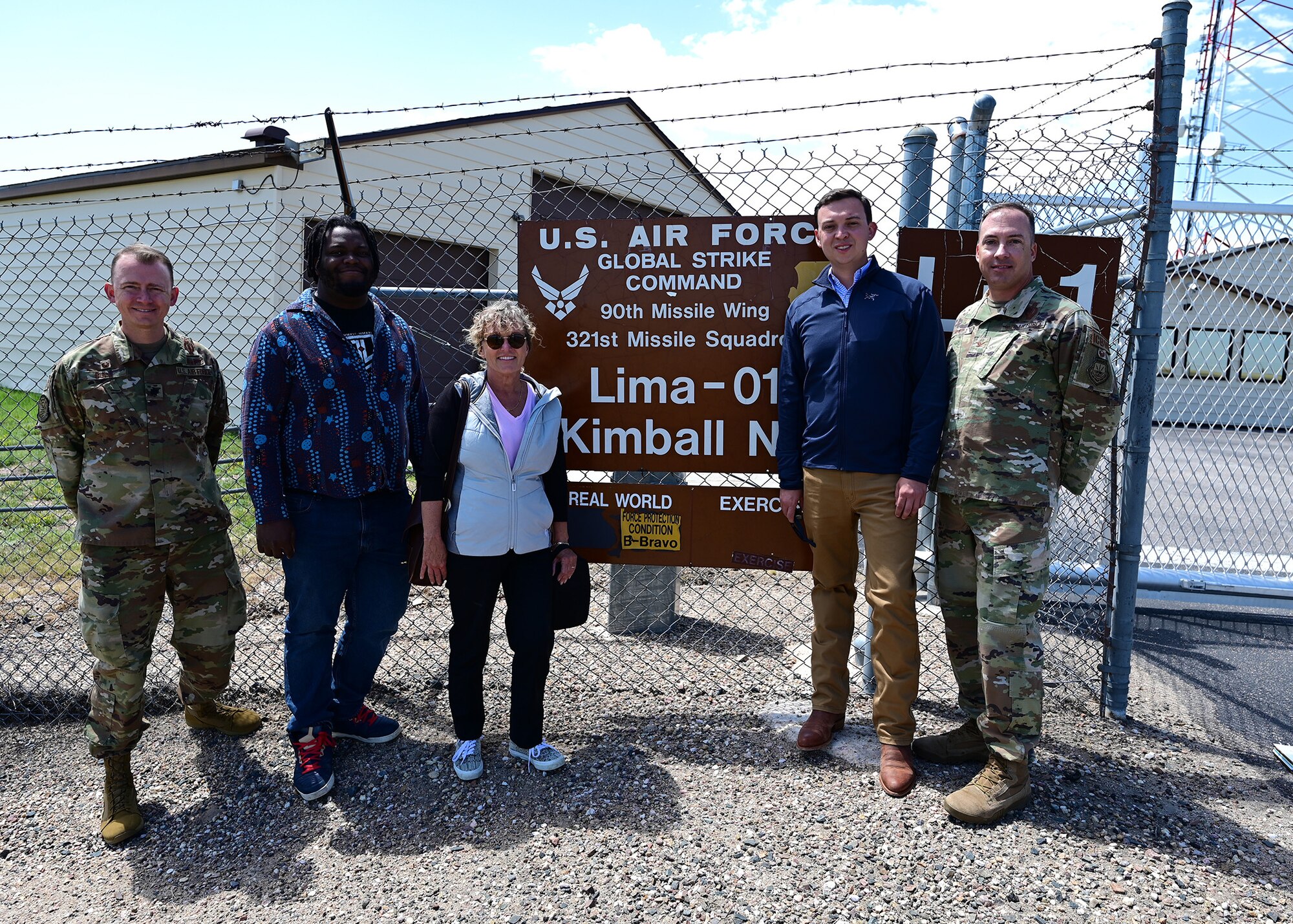 group photo in front of Missile Alert Facility Lima zero one