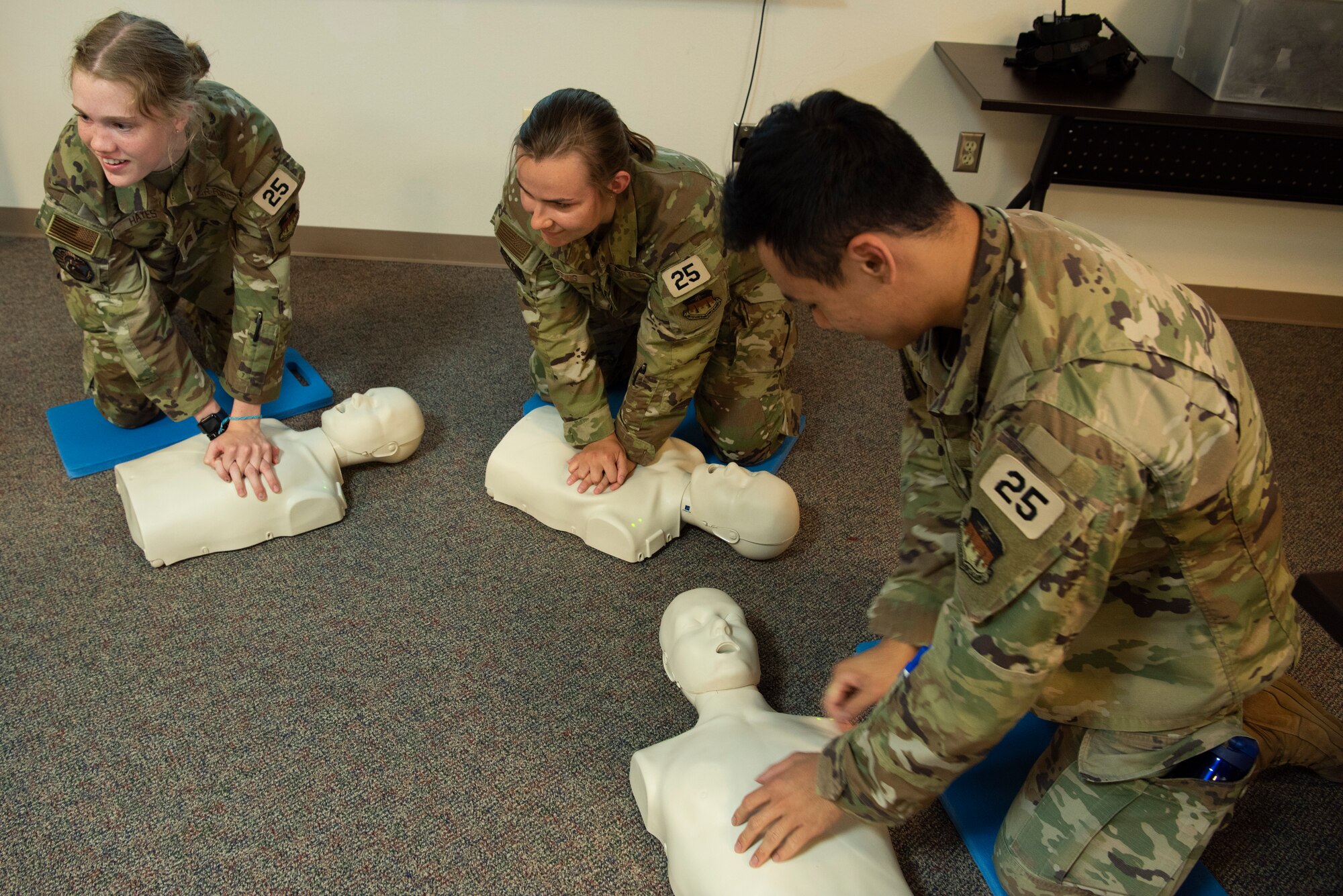U.S. Air Force Academy cadets practice CPR at the 7th Medical Group at Dyess Air Force Base, Texas, June 29, 2023. Dyess hosted groups of Academy and Air Force ROTC cadets in a program that offered prospective officers the opportunity to learn about the base mission and career fields they may be interested in. The cadets toured 14 units around the base like security forces, logistics, medical, flightline operations and civil engineering. (U.S. Air Force photo by Airman 1st Class Alondra Cristobal Hernandez)