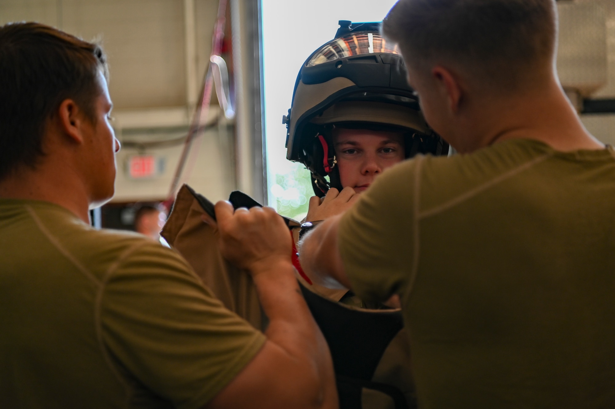 Air Force ROTC cadets attend an Explosive Ordnance Disposal familiarization briefing during an Air Force cadet tour at Dyess Air Force Base, Texas, July 18, 2023. Dyess hosted groups of Air Force Academy and Air Force ROTC cadets in a program that offered prospective officers the opportunity to learn about the base mission and career fields they may be interested in. The cadets toured 14 units around the base like security forces, logistics, medical, flightline operations and civil engineering. (U.S. Air Force photo by Airman 1st Class Emma Anderson)