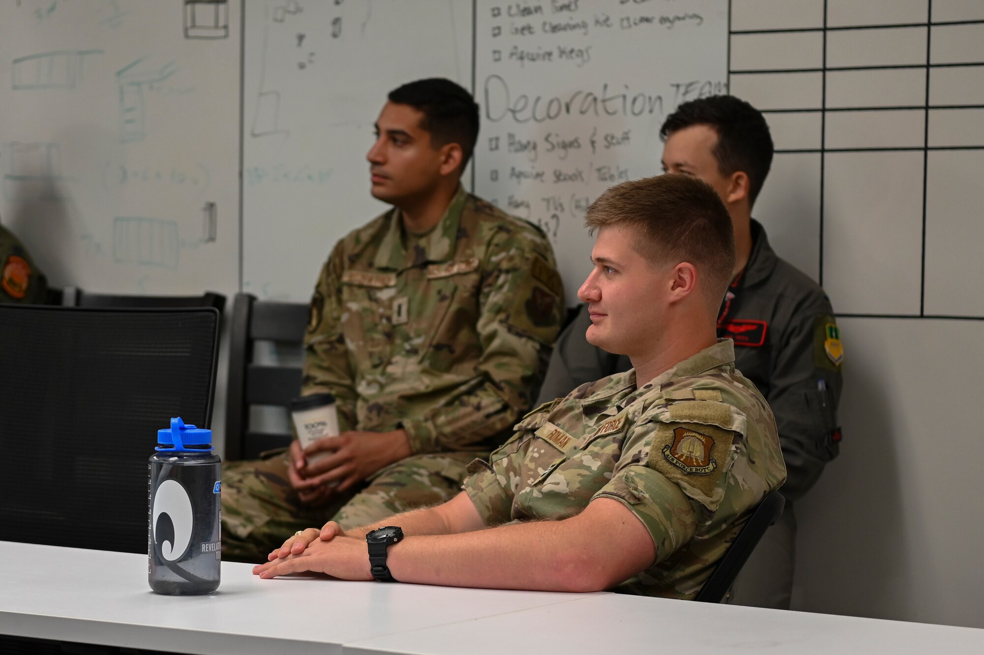 Air Force ROTC cadets attend an Explosive Ordnance Disposal familiarization briefing during an Air Force cadet tour at Dyess Air Force Base, Texas, July 18, 2023. Dyess hosted groups of Air Force Academy and Air Force ROTC cadets in a program that offered prospective officers the opportunity to learn about the base mission and career fields they may be interested in. The cadets toured 14 units around the base like security forces, logistics, medical, flightline operations and civil engineering. (U.S. Air Force photo by Airman 1st Class Emma Anderson)