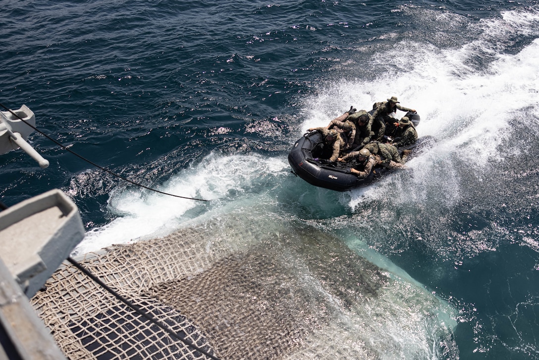 U.S. Marines with Charlie Company, 1st Light Armored Reconnaissance Battalion, 1st Marine Division, and Mexican Infantería de Marina personnel practice steering combat rubber raiding craft into the well deck of the Armada de México tank landing ship ARM Usumacinta during rehearsals as part of Exercise Phoenix/Aztec Alligator 2023 off the coast of Santa Margarita Island, Mexico, July 9, 2023. Exercise Phoenix/Aztec Alligator 2023 is the first iteration of a biennial, bilateral amphibious operations training exercise to develop operational compatibility between Mexico’s Secretaría de Marina and U.S. Marines.