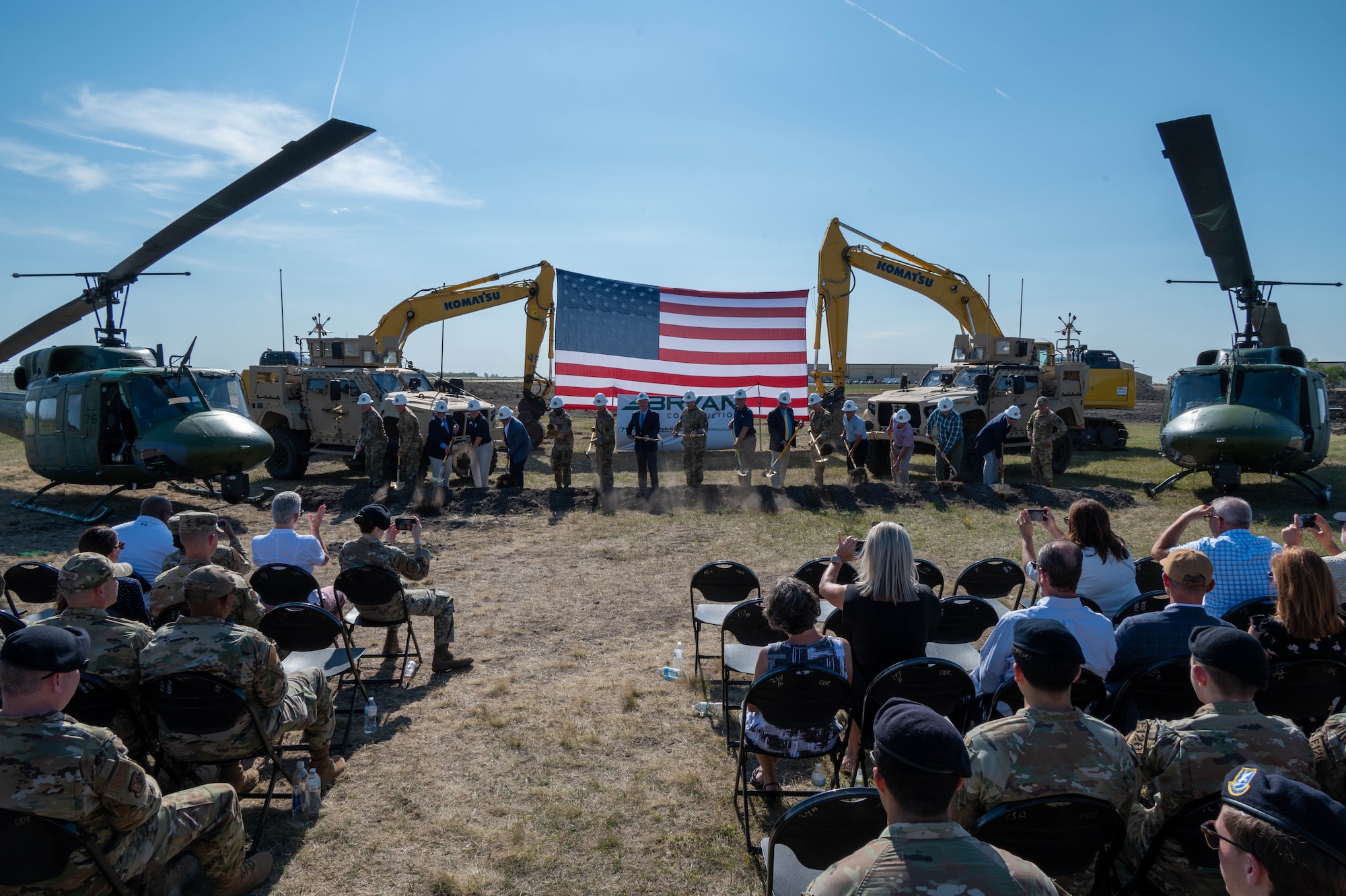 Civic leaders, government officials and senior leaders break ground at the groundbreaking ceremony for the 54th Helicopter Squadron’s new facility Aug. 15, 2023 at Minot Air Force Base, North Dakota. The new facility will house the incoming MH-139 Grey Wolf which will replace the UH-1N Iroquois. (U.S. Air Force photo by Senior Airman Evan Lichtenhan)