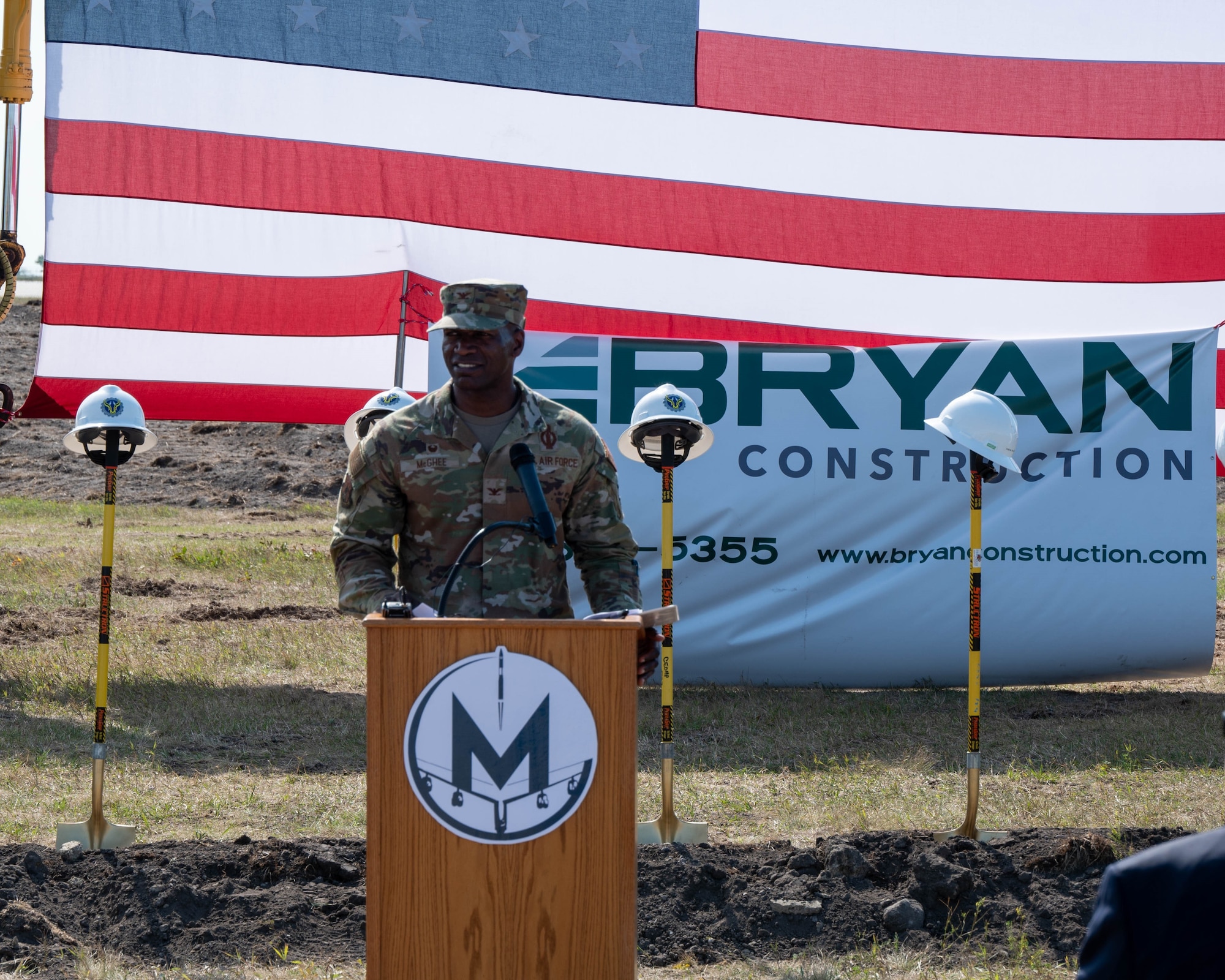 Col. Kenneth McGhee, 91st Missile Wing commander, gives remarks at the groundbreaking ceremony for the 54th Helicopter Squadron’s (HS) new facility Aug. 16, 2023, at Minot Air Force Base, North Dakota. The 54th HS supports emergency war order taskings by transporting tactical response force teams in support of launch facility denial, recapture, and convoy operations. (U.S. Air Force photo by Senior Airman Evan Lichtenhan)