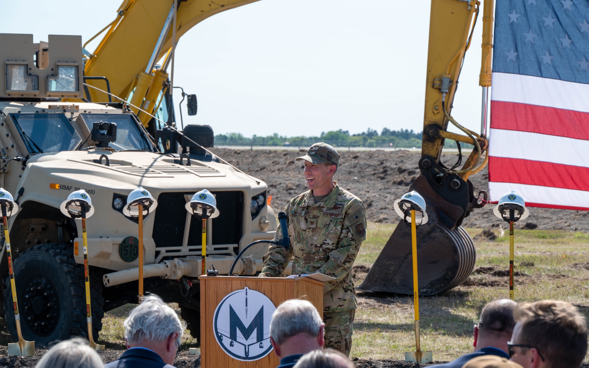 Col. Philip Bryant, commander of the 582nd Helicopter Group, gives remarks at the groundbreaking ceremony for the 54th Helicopter Squadron’s new facility Aug. 16, 2023, at Minot Air Force Base, North Dakota. The new facility will consist of three maintenance hangar bays, six aircraft shelter bays and three hangar bays for aircraft on alert. (U.S. Air Force photo by Senior Airman Evan Lichtenhan)