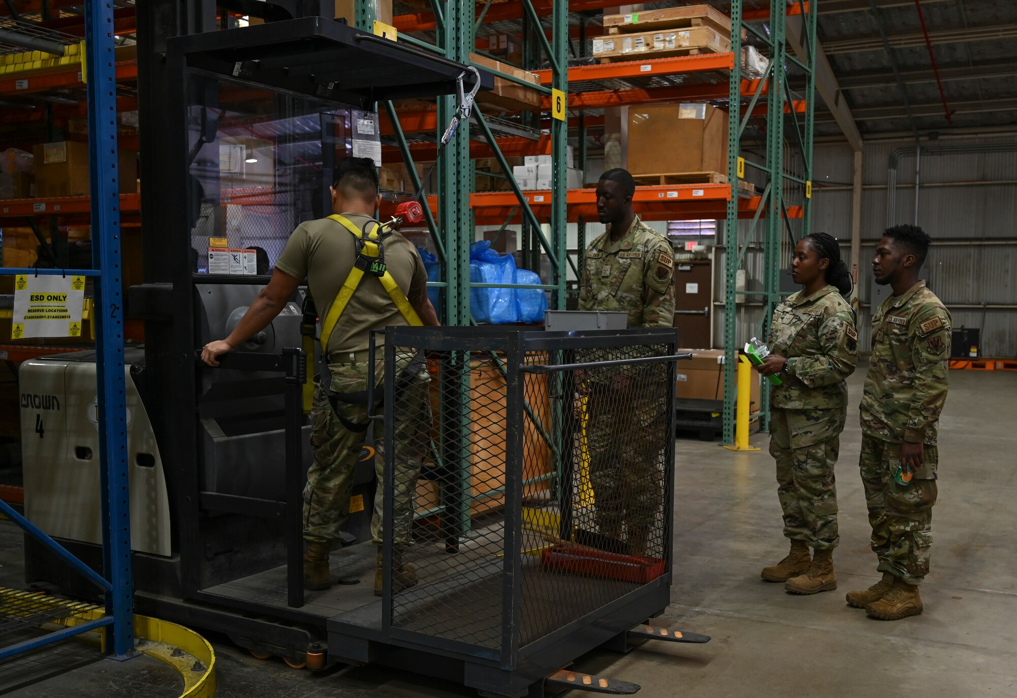 Airmen from the 175th Logistics Readiness Squadron and the receive training to operate the order picker in the supply warehouse at Joint Base Pearl Harbor-Hickam, June 20, 2023.