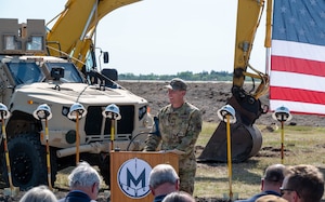 Col. Philip Bryant, commander of the 582nd Helicopter Group, gives remarks at the groundbreaking ceremony for the 54th Helicopter Squadron’s new facility Aug. 16, 2023, at Minot Air Force Base, North Dakota. The new facility will consist of three maintenance hangar bays, six aircraft shelter bays and three hangar bays for aircraft on alert. (U.S. Air Force photo by Senior Airman Evan Lichtenhan)