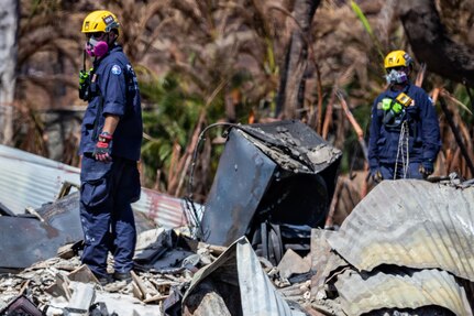 Service members conduct search, rescue and recovery efforts following wildfires in Hawaii.