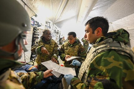 Air Force Reserve medical personnel provide emergency care for a simulated chemical attack victim during Exercise Patriot Medic at Youngstown Air Reserve Station, Ohio, Aug. 16, 2023.