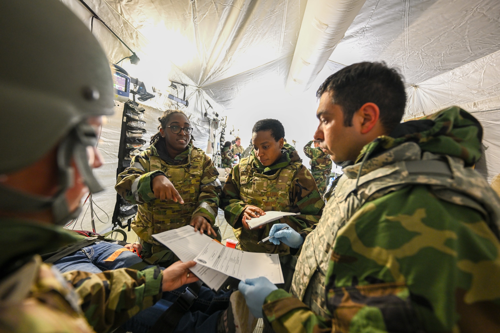 Air Force Reserve medical personnel provide emergency care for a simulated chemical attack victim during Exercise Patriot Medic at Youngstown Air Reserve Station, Ohio, Aug. 16, 2023.