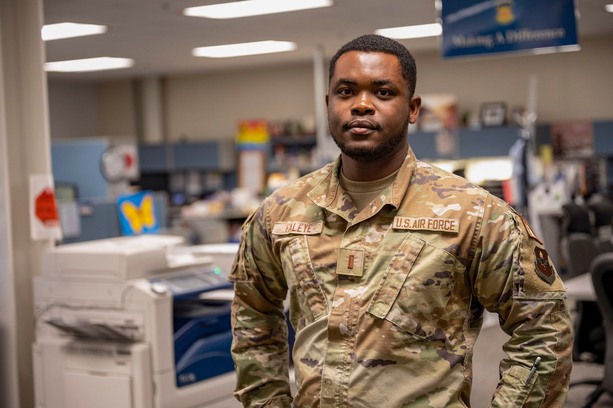U.S. Air Force 2nd Lt. Oluwasegun Faleye, 81st Comptroller Squadron financial analysis flight deputy flight commander, poses for a photo inside finance office.