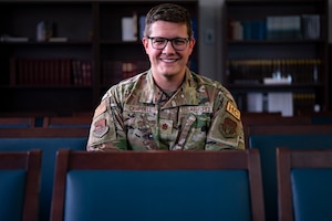 Chaplain (Maj.) Blake Campbell sits in the chapel at Grissom Air Reserve Base, Ind. on August 2, 2023. Campbell was selected as the Indiana American Legion’s Military Person of the Year in the Reserve Category for 2023. (U.S. Air Force Photo by Elise Faurote)