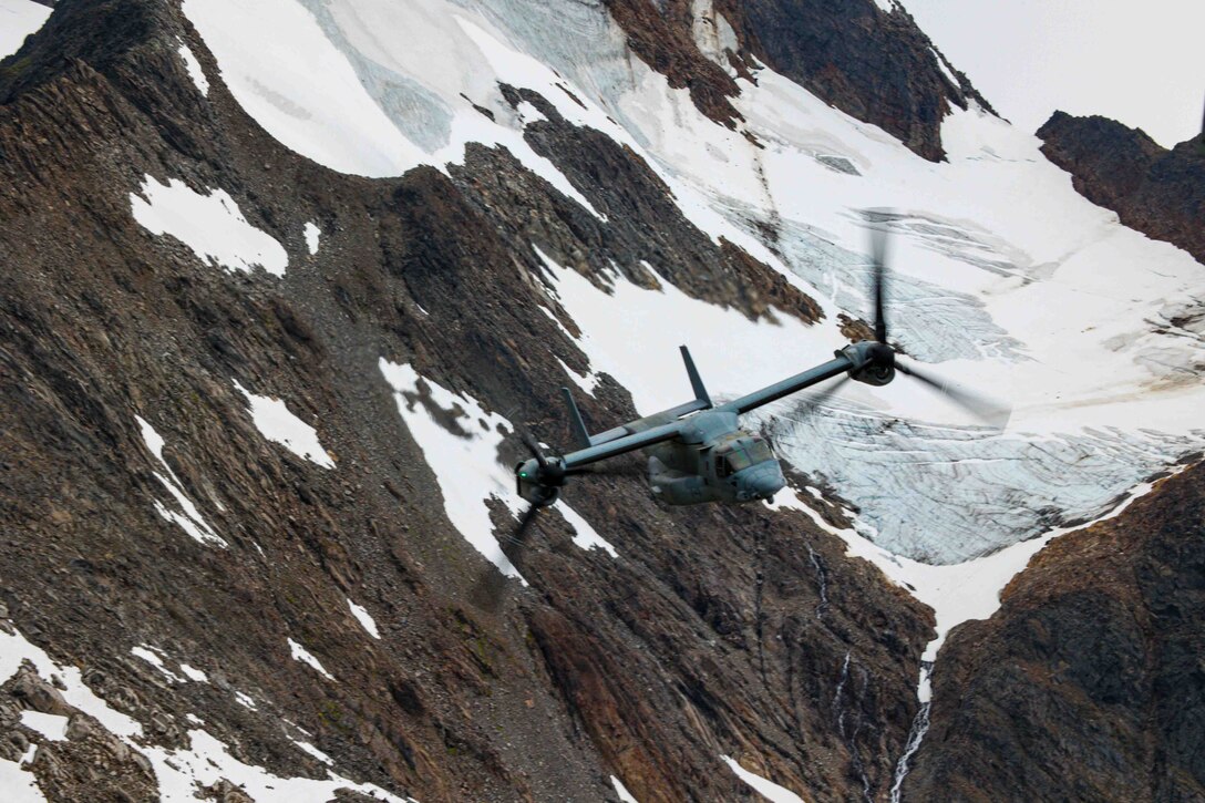 U.S Marine Corps MV-22 Osprey, assigned to the 26th Marine Expeditionary Unit (Special Operations Capable) Bravo Command Element conducts flight operations in Bardufoss, Norway, Aug. 7, 2023. The USS Mesa Verde (LPD-19), assigned to the Bataan Amphibious Ready Group and embarked 26th Marine Expeditionary Unit (Special Operations Capable), under the command and control of Task Force 61/2, is on a scheduled deployment in the U.S Naval Forces Europe area of operations, employed by U.S. Sixth Fleet to defend U.S, allies and partner interests. (U.S. Marine Corps photo by Cpl. Aziza Kamuhanda)