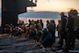 Sailors rig the barricade in a flight deck drill on aircraft carrier USS Nimitz (CVN 68). Nimitz is currently underway conducting routine operations.