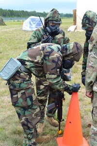 Wisconsin Air National Guard 128th Air Control Squadron Airmen train on operating in an environmentally hazardous area July 14, 2023, at Alpena Combat Readiness Training Center, Mich. Members of the 128th trained two weeks on new forward operating location tactics and equipment, which improves the unit’s overall readiness for a potential near-peer conflict.