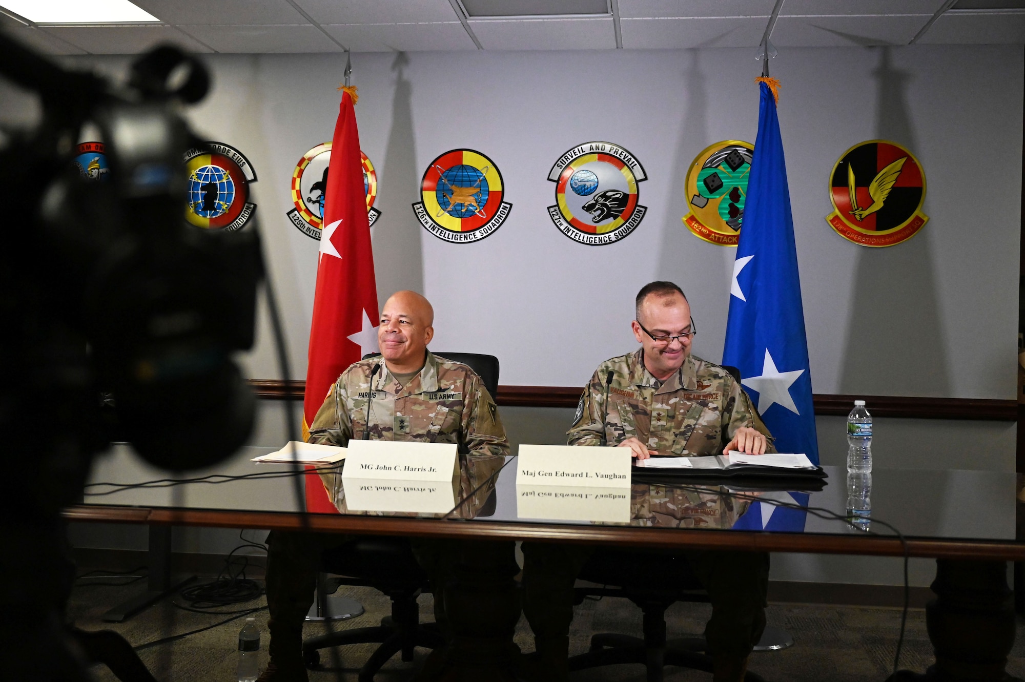 U.S. Air Force Maj. Gen. Edward Vaughan, director of space operations for the National Guard Bureau, and U.S. Army Maj. Gen. John C. Harris Jr., Ohio adjutant general, sit for a virtual media round table with journalists from around the country Aug. 10, 2023 during Vulcan Guard, a space-focused exercise incorporating several diverse space weapons systems in realistic threat-based scenarios and hosted at the 178th Wing in Springfield, Ohio. Personnel from all seven NGB states that currently conduct space operations, U.S. Space Command and the Brazilian military participated in the week-long exercise. (U.S. Air National Guard photo by Airman 1st Class Colin Simpson)