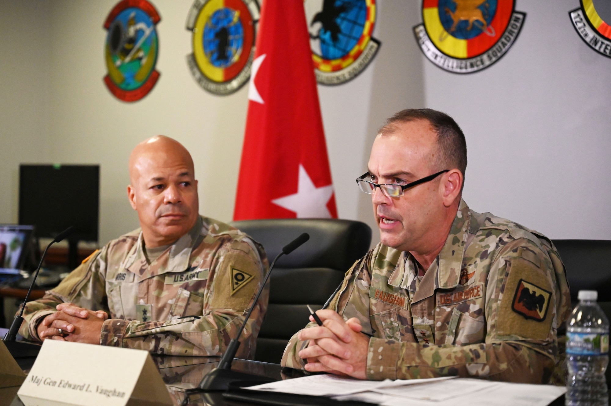 U.S. Air Force Maj. Gen. Edward Vaughan, director of space operations for the National Guard Bureau, and U.S. Army Maj. Gen. John C. Harris Jr., Ohio adjutant general, sit for a virtual media round table with journalists from around the country Aug. 10, 2023 during Vulcan Guard, a space-focused exercise incorporating several diverse space weapons systems in realistic threat-based scenarios and hosted at the 178th Wing in Springfield, Ohio. Personnel from all seven NGB states that currently conduct space operations, U.S. Space Command and the Brazilian military participated in the week-long exercise. (U.S. Air National Guard photo by Airman 1st Class Colin Simpson)