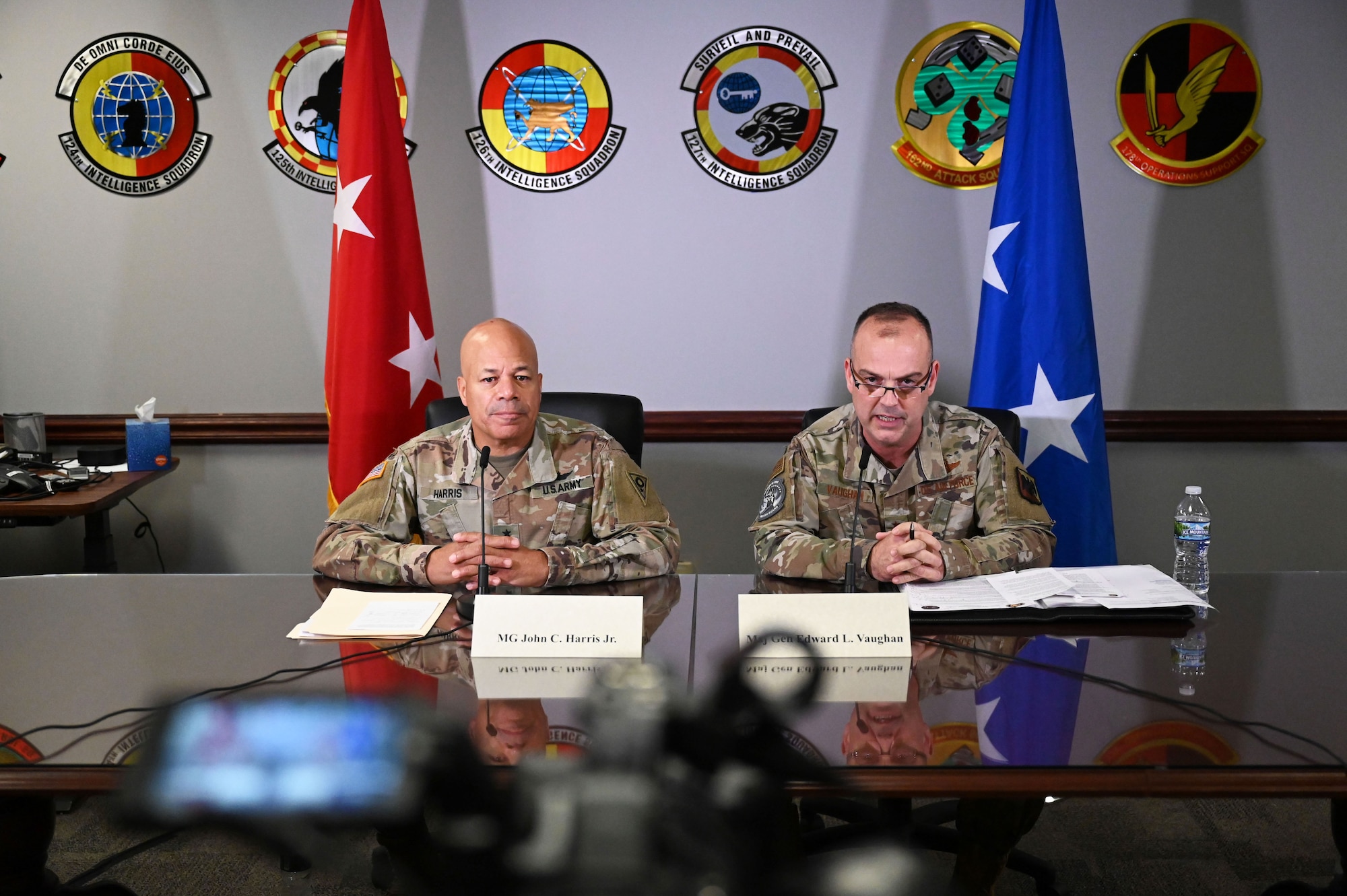 U.S. Air Force Maj. Gen. Edward Vaughan, director of space operations for the National Guard Bureau, and U.S. Army Maj. Gen. John C. Harris Jr., Ohio adjutant general, sit for a virtual media round table with journalists from around the country Aug. 10, 2023 during Vulcan Guard, a space-focused exercise incorporating several diverse space weapons systems in realistic threat-based scenarios and hosted at the 178th Wing in Springfield, Ohio. Personnel from all seven NGB states that currently conduct space operations, U.S. Space Command and the Brazilian military participated in the week-long exercise. (U.S. Air National Guard photo by Airman 1st Class Colin Simpson)