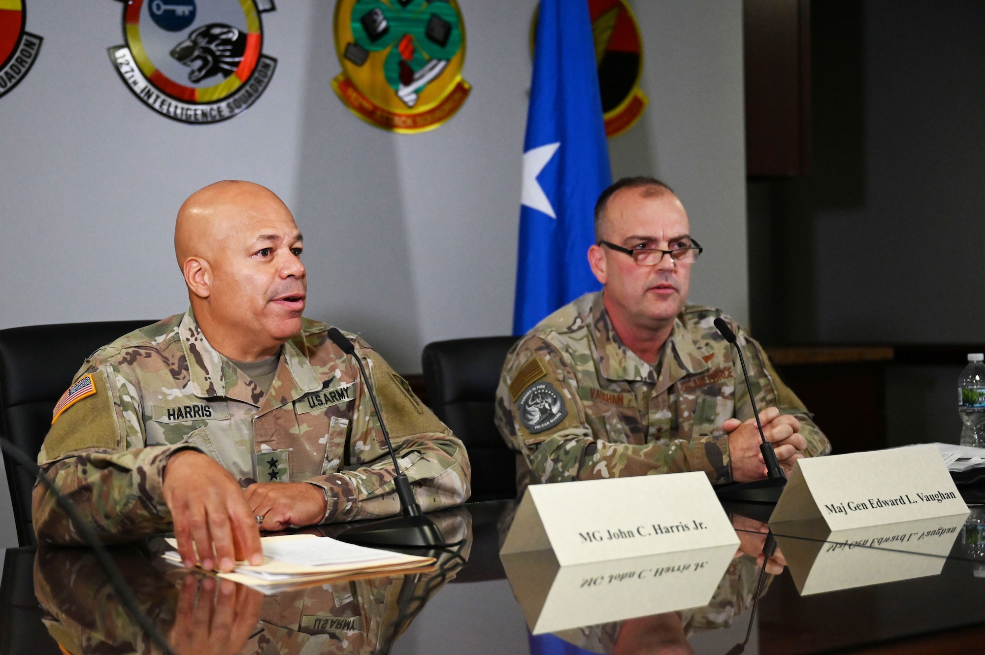 U.S. Air Force Maj. Gen. Edward Vaughan, director of space operations for the National Guard Bureau, and U.S. Army Maj. Gen. John C. Harris Jr., Ohio adjutant general, sit for a virtual media round table with journalists from around the country Aug. 10, 2023 during Vulcan Guard, a space-focused exercise incorporating several diverse space weapons systems in realistic threat-based scenarios and hosted at the 178th Wing in Springfield, Ohio. Personnel from all seven NGB states that currently conduct space operations, U.S. Space Command and the Brazilian military participated in the week-long exercise. (U.S. Air National Guard photo by Airman 1st Class Colin Simpson)