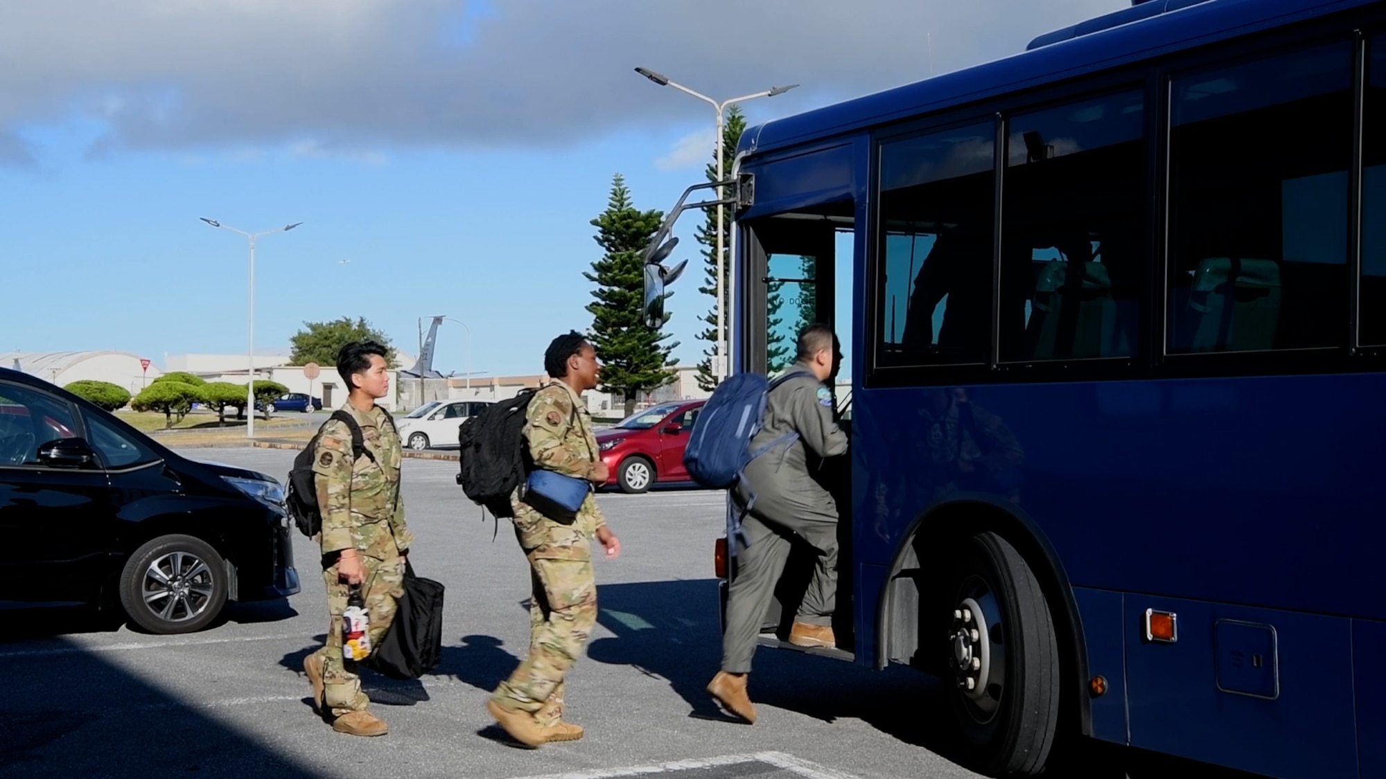 airmen board bus