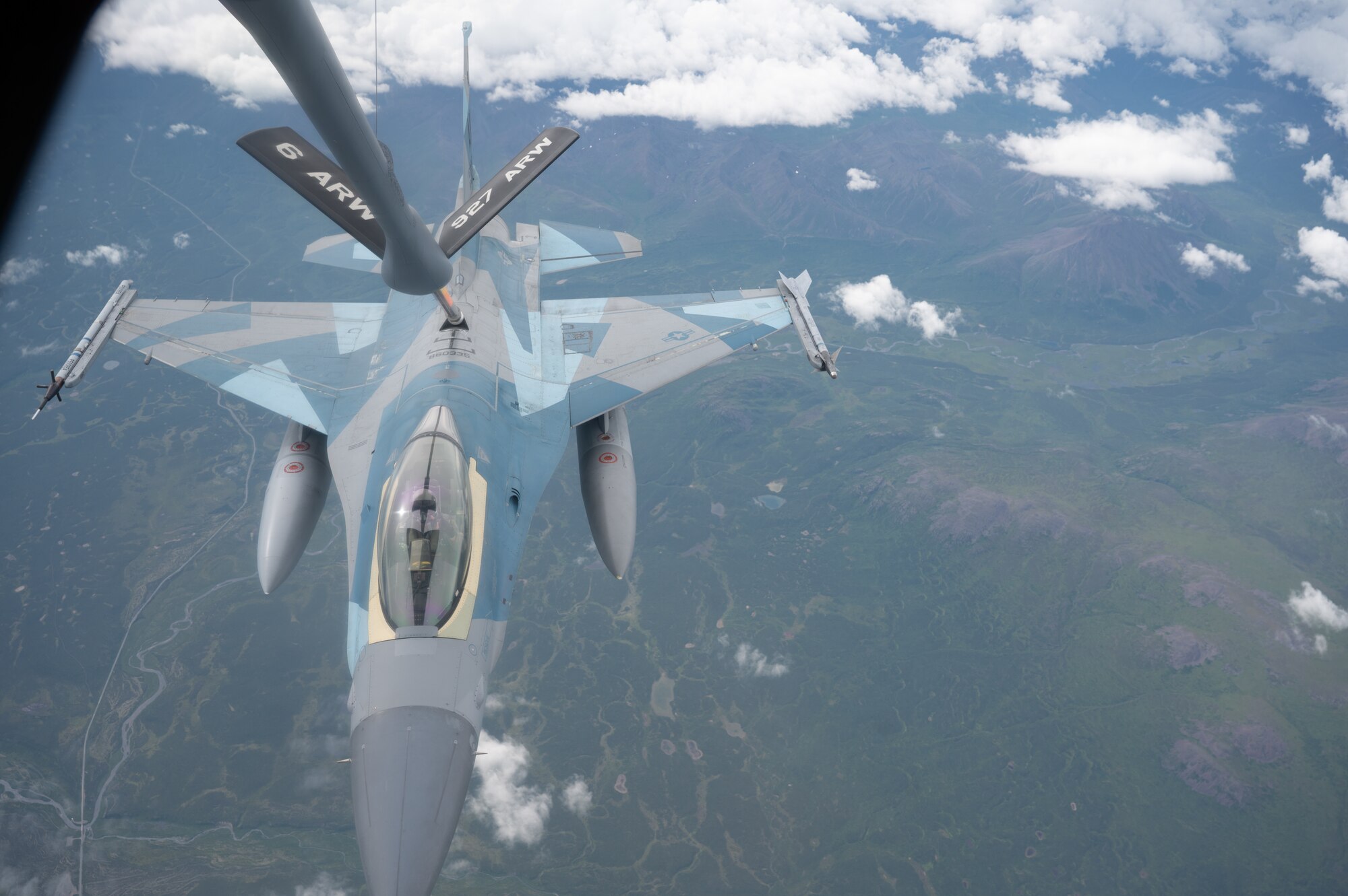 U.S. Air Force F-16 Fighting Falcon, assigned to the 18th Aggressor Squadron, Eielson Air Force Base, flies in for a refueling from a KC-135 Stratotanker assigned to the 168th Air Refueling Squadron over Joint Pacific-Alaska Range Complex during Red Flag-Alaska 23-3, Aug. 15, 2023.