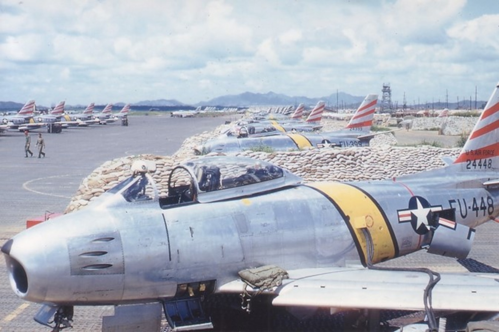 U.S. Air Force F-86 Sabres assigned to the 51st Fighter-Interceptor Wing, are lined up in revetments at Suwon Air Base, Republic of Korea, circa June 1953. (Courtesy photo)