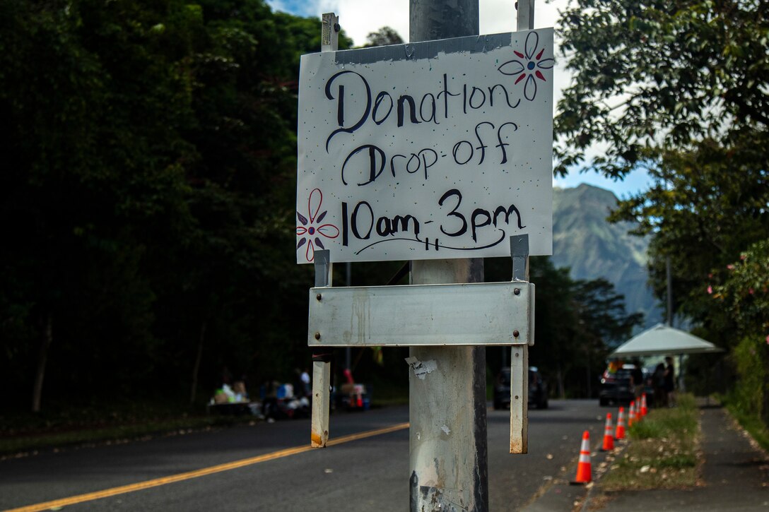U.S. Marines, sailors and civilian volunteers with the Single Marine and Sailor Program host a donation drop off in the ongoing disaster relief efforts for the Maui wildfires, Kaneohe, August 13, 2023. Locals and service members donated nonperishable food, toiletries, towels, baby supplies, bedding and clothes to the refugees of the Maui wildfires. (U.S. Marine Corps photo by Lance Cpl. Hunter Jones)