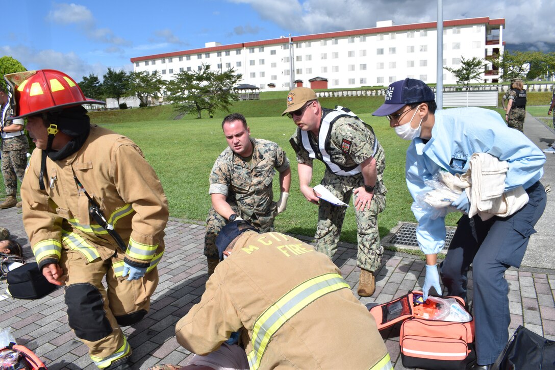Several key members of Combined Arms Training Center, Camp Fuji, were tested on their response capabilities during Exercise Mamoru, August 17, 2023. The mass casualty exercise was designed to see how Marines and base first responders could potentially help and evacuate wounded individuals at the small installation. Mamoru is a Japanese word, it means - to protect.  (U.S. Marine Corps photo by Song Jordan)
