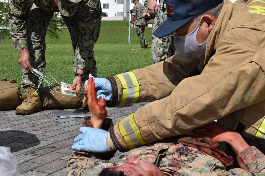 Several key members of Combined Arms Training Center, Camp Fuji, were tested on their response capabilities during Exercise Mamoru, August 17, 2023. The mass casualty exercise was designed to see how Marines and base first responders could potentially help and evacuate wounded individuals at the small installation. Mamoru is a Japanese word, it means - to protect.  (U.S. Marine Corps photo by Song Jordan)