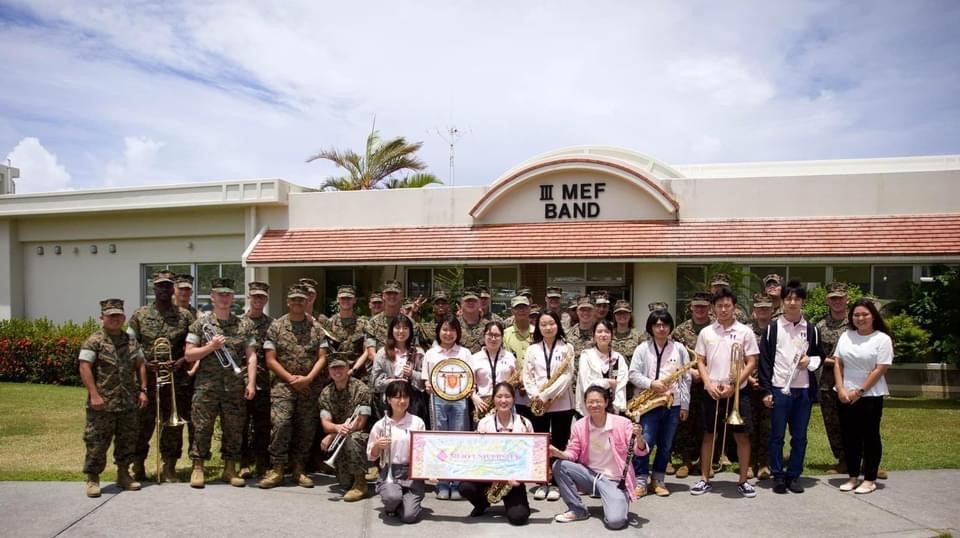 Group photo after music clinic with III MEF Band and Meio University musicians