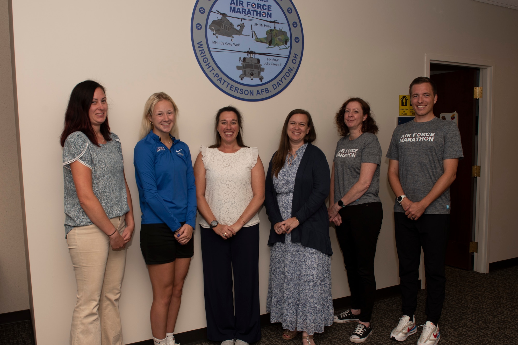 Air Force Marathon staff pose for a photo in their office on Wright-Patterson Air Force Base, Ohio