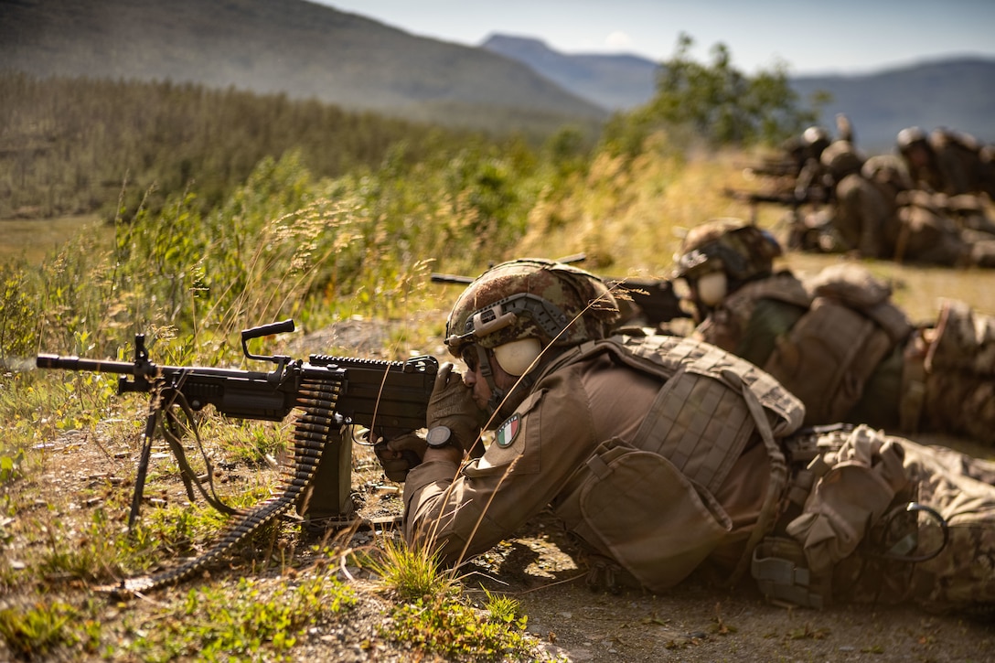 U.S. Marines with the Battalion Landing Team 1/6, 26th Marine Expeditionary Unit (Special Operations Capable) (MEU(SOC)) Bravo Command Element, and service members from the Italian Marines San Marco Brigade participates in an integrated live-fire range part of a Norwegian Bilateral Exercise in Setermoen, Norway, Aug. 9, 2023. The San Antonio-class amphibious transport dock ship USS Mesa Verde (LPD 19), assigned to the Bataan Amphibious Ready Group and embarked 26th MEU(SOC), under the command and control of Task Force 61/2, is on a scheduled deployment in the U.S. Naval Forces Europe area of operations, employed by U.S. Sixth Fleet to defend U.S., allied and partner interests. (U.S. Marine Corps photo by Cpl. Michele Clarke)