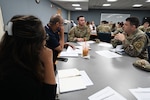 Students participate in an on-site course at Hanscom Air Force Base, Mass., hosted at the Education and Training Center. (U.S. Air Force photo by Jerry Saslav)