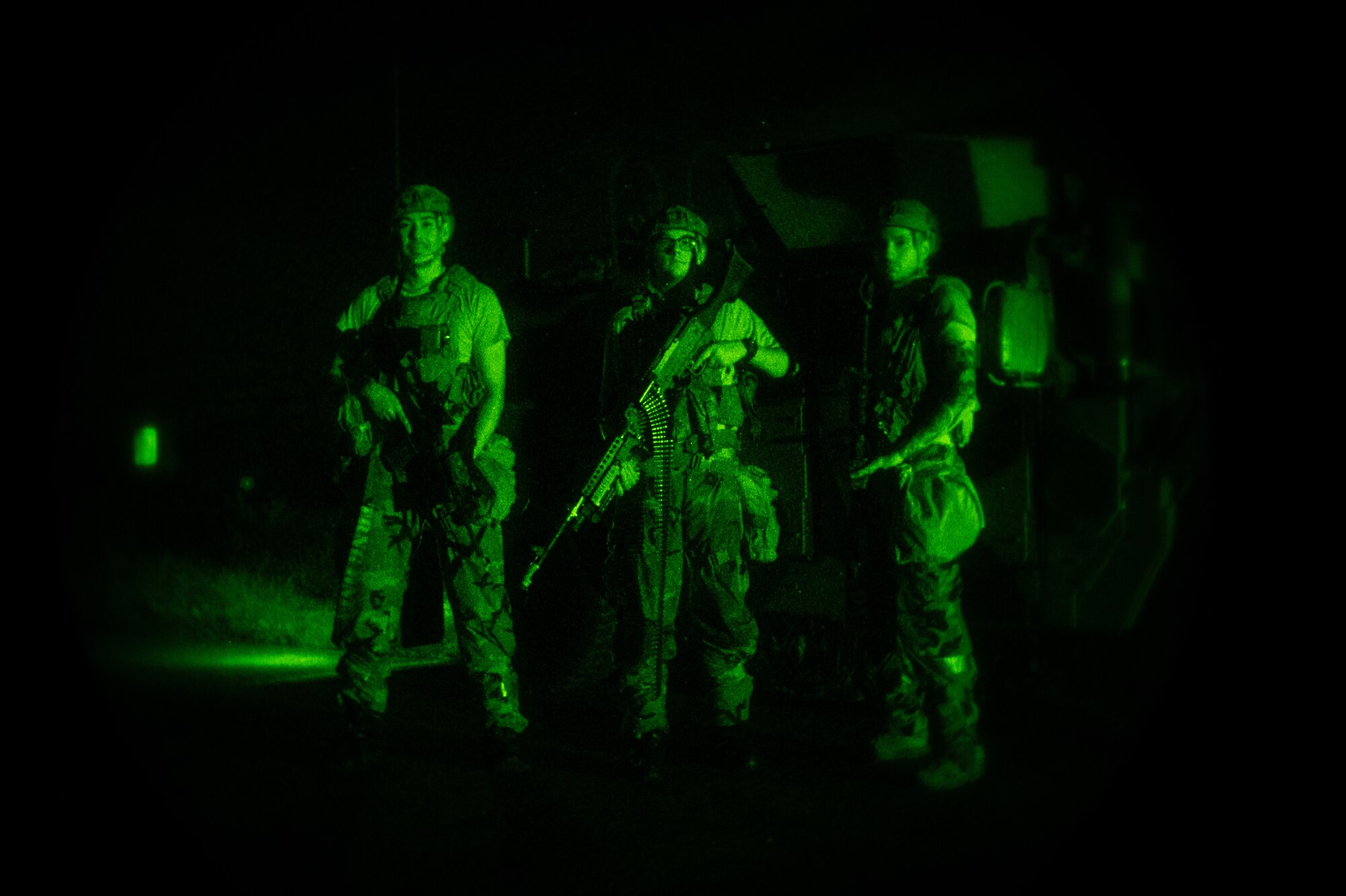 From the left, U.S. Air Force Staff Sgt. Gabriel Santiago, Airman 1st Class Schroeder Hopwood, and Airman 1st Class Edwin Mendoza-Vendrell, 51st Security Forces Squadron Defenders, pose for a group photo after responding to a simulated ground attack at Osan Air Base, Republic of Korea, Aug. 3, 2023. The importance of these scenarios lies in providing Airmen with realistic experiences, preparing them to face ground threats with confidence and competence. (U.S. Air Force photo by Staff Sgt. Thomas Sjoberg)
