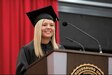 U.S. Army 1st Lt. Mickayla Grow, assigned to the 108th Area Support Medical Company, 213th Regional Support Group, speaks at the East Stroudsburg University graduate commencement ceremony, May 5, 2023. (Courtesy Photo)